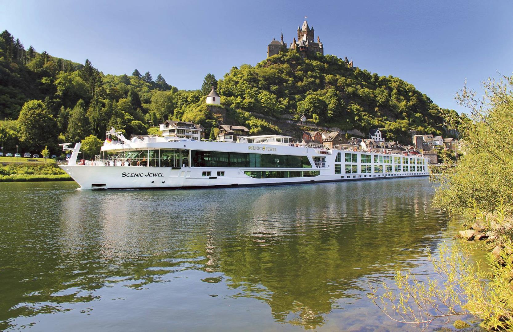 Exterior view of Scenic Jewel sailing near Reichsburg Castle
